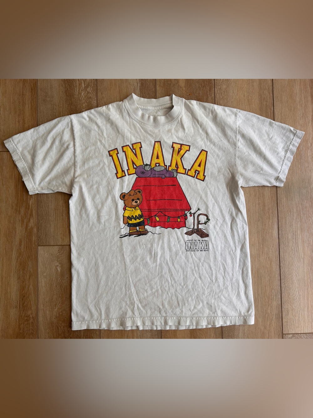Inaka Power White Tee with Red Doghouse and Yellow Lettering
